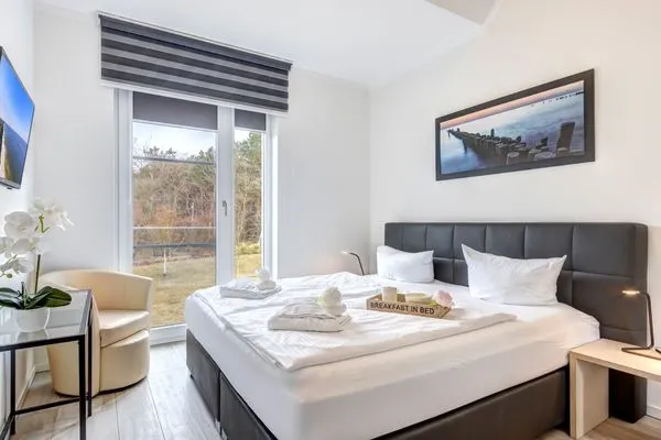 Schlafzimmer  Ferienhaus Elysium - Rosa