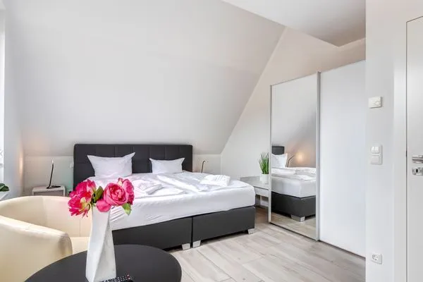 Schlafzimmer  Ferienhaus Elysium - Rosa