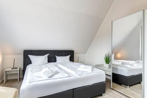 Schlafzimmer  Ferienhaus Elysium - Rosa