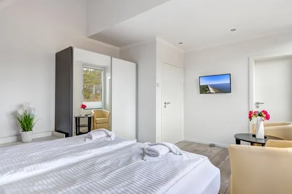 Schlafzimmer  Ferienhaus Elysium - Rosa