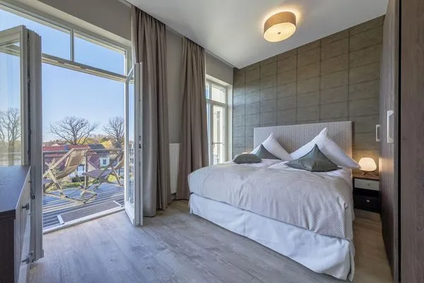 Ferienwohnung Ostseezeit Ostseebad Wustrow ZweiWasser Alte Seefahrtschule Schlafzimmer  Ostseezeit