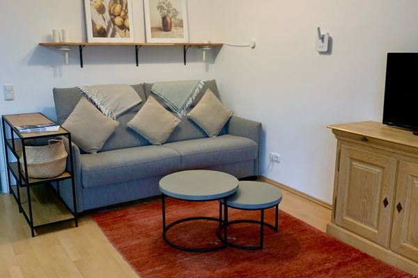  Ferienwohnung Bergblick Ferienwohnungen in Weissensee - Wohnzimmer