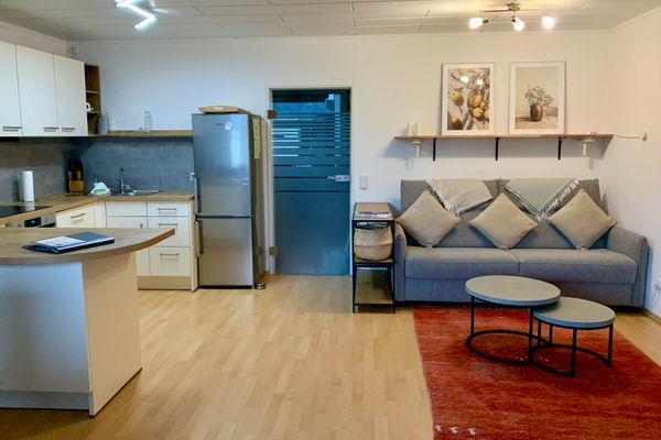  Ferienwohnung Bergblick Ferienwohnungen in Weissensee - Wohnzimmer