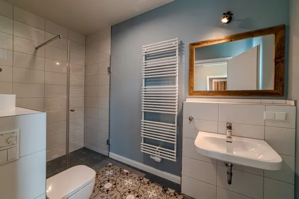 Badezimmer  Reethus 54° Loddin mit Sauna und Kamin