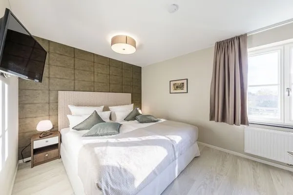 Ferienwohnung Boddendomizil Ostseebad Wustrow ZweiWasser Alte Seefahrtschule Schlafzimmer mit Doppelbett  Boddendomizil