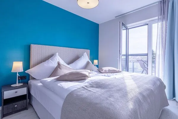 Ferienwohnung Boddenglück Ostseebad Wustrow ZweiWasser Alte Seefahrtschule Schlafzimmer mit Doppelbett  Boddenglück