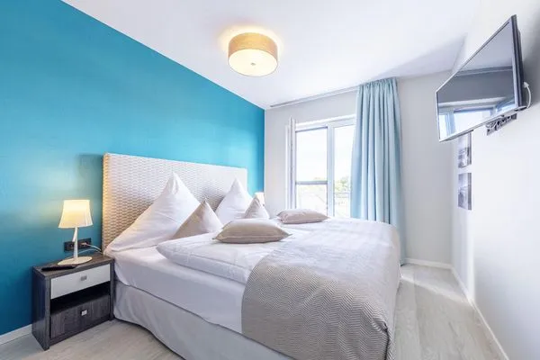 Ferienwohnung Boddensonne Ostseebad Wustrow ZweiWasser Alte Seefahrtschule Schlafzimmer mit Doppelbett  Boddensonne