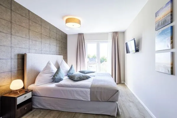 Ferienwohnung Boddendeck Ostseebad Wustrow ZweiWasser Alte Seefahrtschule Schlafzimmer mit Doppelbett  Boddendeck