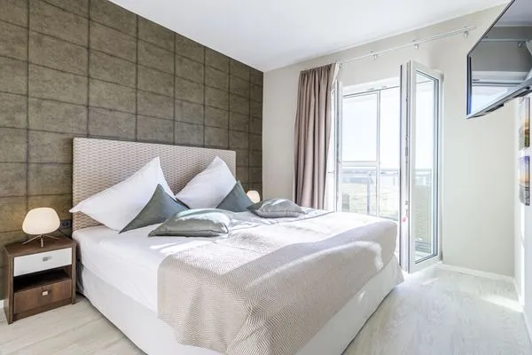 Ferienwohnung Dünenlounge Ostseebad Wustrow ZweiWasser Alte Seefahrtschule Schlafzimmer  Dünenlounge