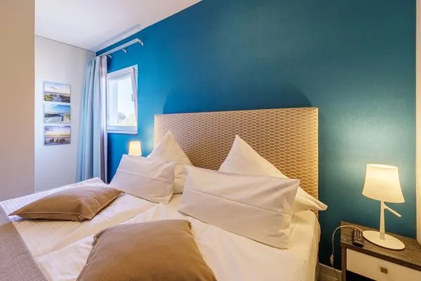 Ferienwohnung Dünenquartier Ostseebad Wustrow ZweiWasser Alte Seefahrtschule Schlafzimmer  Dünenquartier