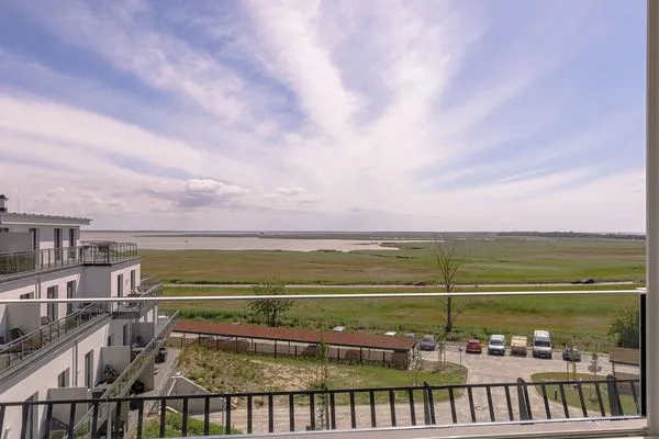 Ferienwohnung Seebadquartier Ostseebad Wustrow Balkon mit Ausblick auf Boddenlandschaft  Seebadquartier