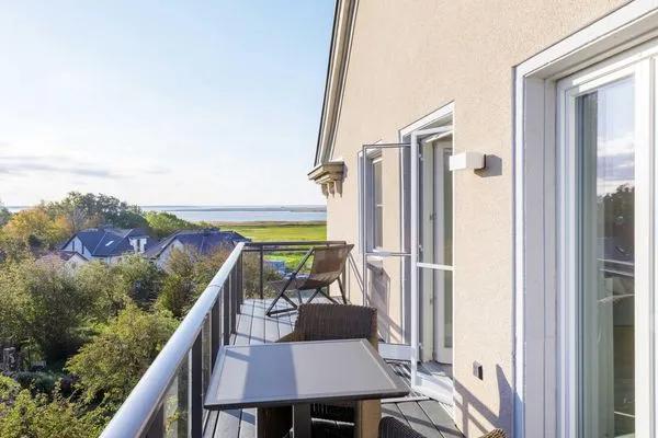 Ferienwohnung Sonnenaufgang Ostseebad Wustrow ZweiWasser Alte Seefahrtschule Sonnenstunden auf dem Balkon mit Ausblick  Sonnenaufgang