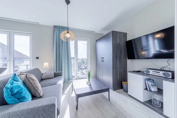 Ferienwohnung Sommerbrise Ostseebad Wustrow ZweiWasser Alte Seefahrtschule Helles Wohnzimmer  Sommerbrise