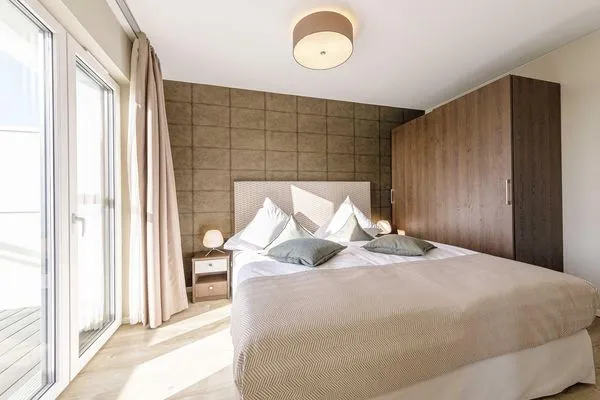 Ferienwohnung Sommersuite Ostseebad Wustrow ZweiWasser Alte Seefahrtschule Schlafzimmer  Sommersuite