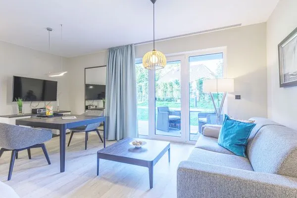 Ferienwohnung Kleine Strandburg Ostseebad Wustrow ZweiWasser Alte Seefahrtschule Lichtdurchfluteter Wohnbereich  Kleine Strandburg