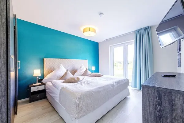 Ferienwohnung Strandflair Ostseebad Wustrow ZweiWasser Alte Seefahrtschule Schlafzimmer  Strandflair