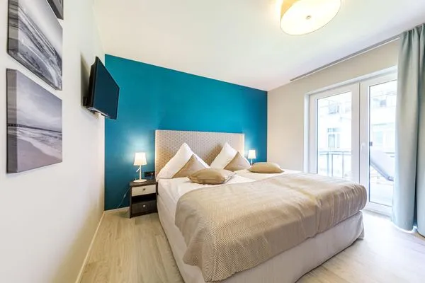 Ferienwohnung Große Strandmuschel Ostseebad Wustrow ZweiWasser Alte Seefahrtschule Schlafzimmer  Große Strandmuschel