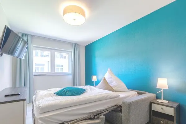 Ferienwohnung Große Strandmuschel Ostseebad Wustrow ZweiWasser Alte Seefahrtschule Schlafzimmer  Große Strandmuschel