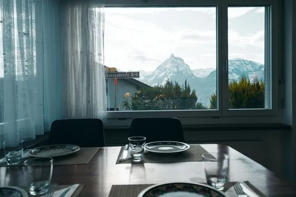 From the dining table you can enjoy a view of the Mürtschenstock mountain  Apartment Im Aeschen