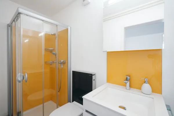 Modern bathroom with shower  Apartment Im Aeschen