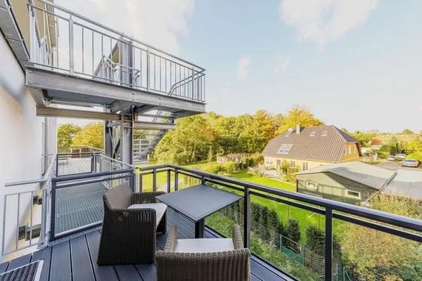 Ferienwohnung Kleine Strandperle Ostseebad Wustrow ZweiWasser Alte Seefahrtschule Balkon für Sonnenstunden  Kleine Strandperle