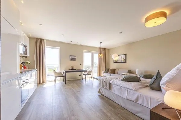 Ferienwohnung Kleine Strandoase Ostseebad Wustrow ZweiWasser Alte Seefahrtschule Heller Wohnbereich  Kleine Strandoase