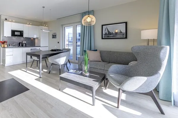 Ferienwohnung Stranddomizil Ostseebad Wustrow ZweiWasser Alte Seefahrtschule Heller Wohnbereich  Stranddomizil