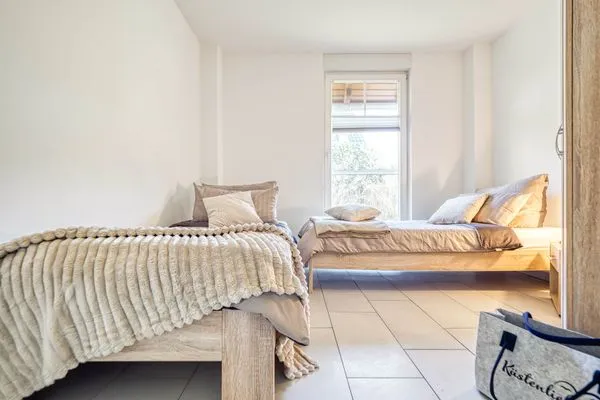 Schlafzimmer mit zwei Einzelbetten Hafenstrasse 15 in Prerow Ephelia in Prerow