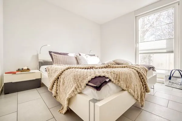 Schlafzimmer mit Doppelbett Hafenstrasse 15 in Prerow Ephelia in Prerow