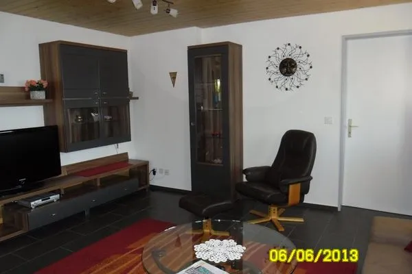Wohnzimmer mit TV  Apartment Aeschen Mirador