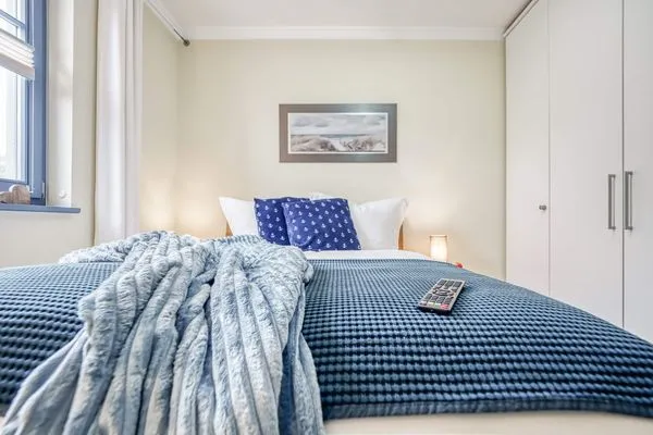 Schlafzimmer mit Doppelbett  Birkmaase 10 - Wohnung 1