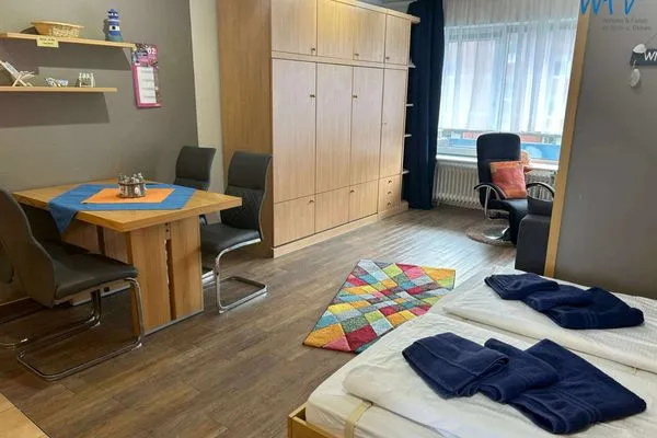 Wohnzimmer Holiday Residenz II Ferienwohnung Sandburg