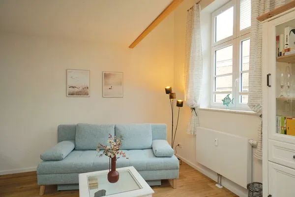 Wohnzimmer  Ferienwohnung 'An der Schlei' für bis zu drei Personen mit Blick auf den Schleswiger Dom