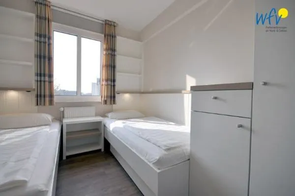 Schlafzimmer Haus Dünenblick Ferienwohnung 11