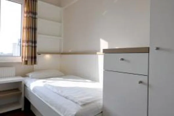 Schlafzimmer Haus Dünenblick Ferienwohnung 11