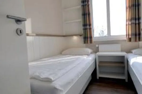 Schlafzimmer Haus Dünenblick Ferienwohnung 11