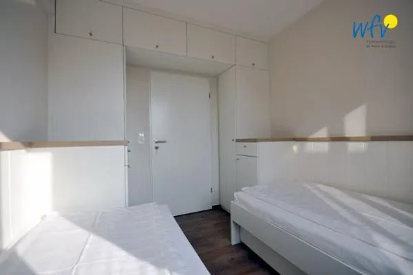 Schlafzimmer Haus Dünenblick Ferienwohnung 11