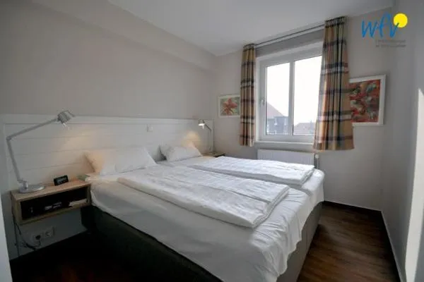 Schlafzimmer Haus Dünenblick Ferienwohnung 11