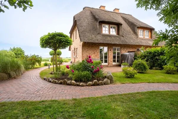 Reetdachhaus Lütt Strandhüs Reetdachhaus Lütt Strandhüs SPO Boehl - 