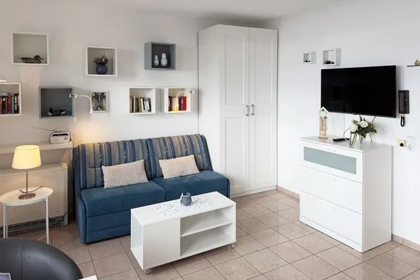 Wohnzimmer Haus *Südspitze 34* Ferienwohnung „Südspitze 34/23 - Schlieter"