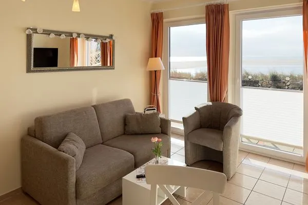 Wohnzimmer Haus *Südspitze 34* Ferienwohnung  „Südspitze 34/24 - Schlieter"