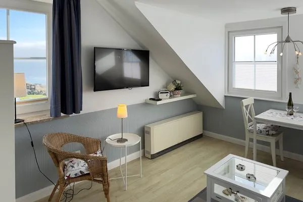 Wohnzimmer Haus *Südspitze 34* Ferienwohnung „Südspitze 34/25 - Schlieter"