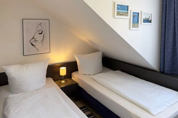 Schlafzimmer Haus *Südspitze 34* Ferienwohnung„Südspitze 34/27 - Schlieter"