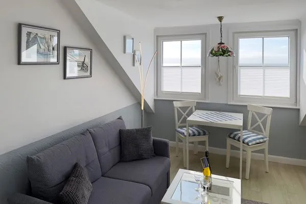 Wohnzimmer Haus *Südspitze 34* Ferienwohnung„Südspitze 34/27 - Schlieter"