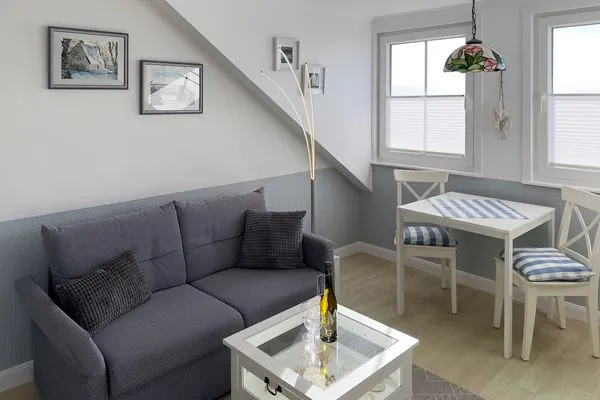 Wohnzimmer Haus *Südspitze 34* Ferienwohnung„Südspitze 34/27 - Schlieter"