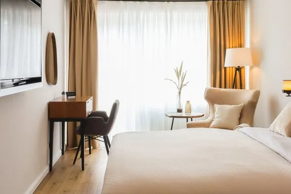 Willkommen im modern gemütlichen Appartement für 2 Personen im Landhaus Haffkrug an der Ostsee  Hochwertige Ferienwohnung in ruhiger Lage mit eigener Terrasse, nur 7 Gehminuten zum Strand entfernt