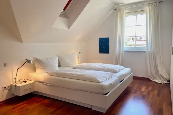 Ferienhaus Seestrasse Ferienwohnung Seeblick Nonnenhorn - Schlafzimmer 2 - Doppelbett