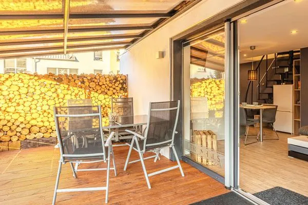 Ferienhaus Charlotta Waren (Müritz) - gr0ße Terrasse mit Grillplatz  Charlotta