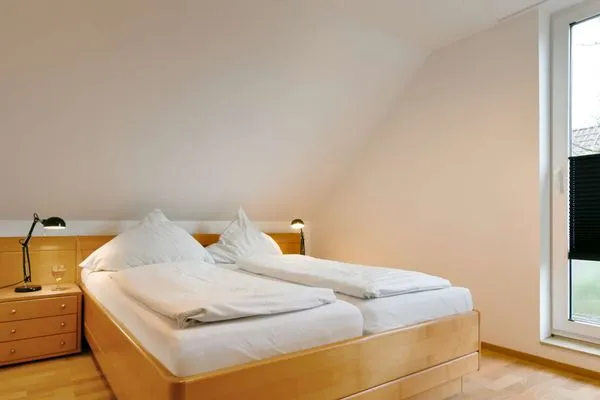 Schlafzimmer Maisonette-Wohnungen am Steingarten Ferienwohnung 4