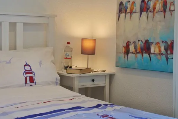 Schlafzimmer mit Doppelbett  Kapitänsgarten Wohnung 25